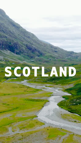 Vertical-Video-Aerial-Drone-Shot-Of-Glen-And-Countryside-In-UK-With-Animated-Graphic-Spelling-Out-Scotland